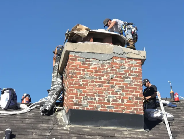 Pataskala Chimney Sweep installing a custom chimney crown in Pataskala, OH