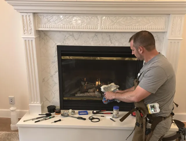 Pataskala Chimney Sweep performing fireplace maintenance in Pataskala, OH